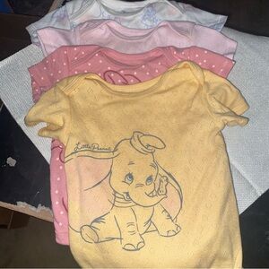 4 Disney baby onesies